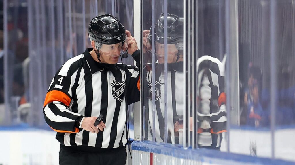 Nhl referee wes mccauley talking to toronto for review solo 2025.jpg