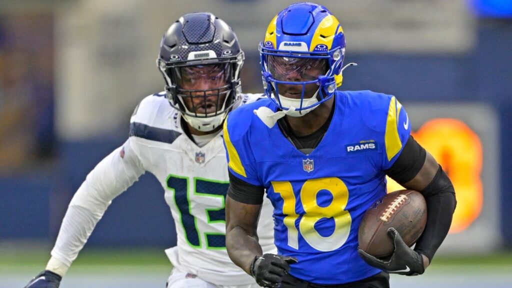 Tyler johnson with rams running with ball jets wr 2025.jpg