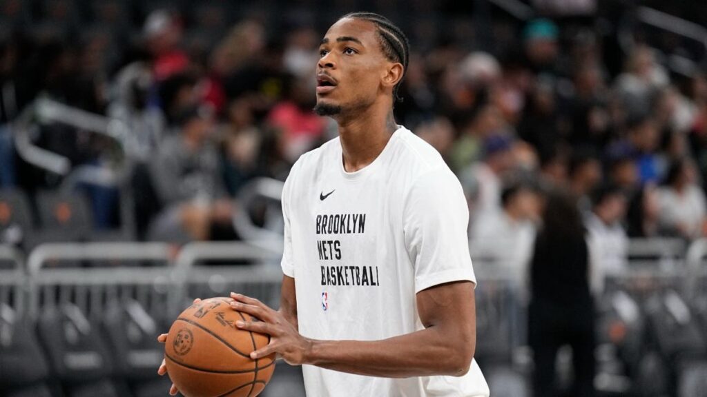 Dennis smith jr white nets warmup jersey solo.jpg